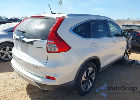 2016 Honda Cr-V Touring z USA, uszkodzony, nr VIN 5J6RM4H90GL104299